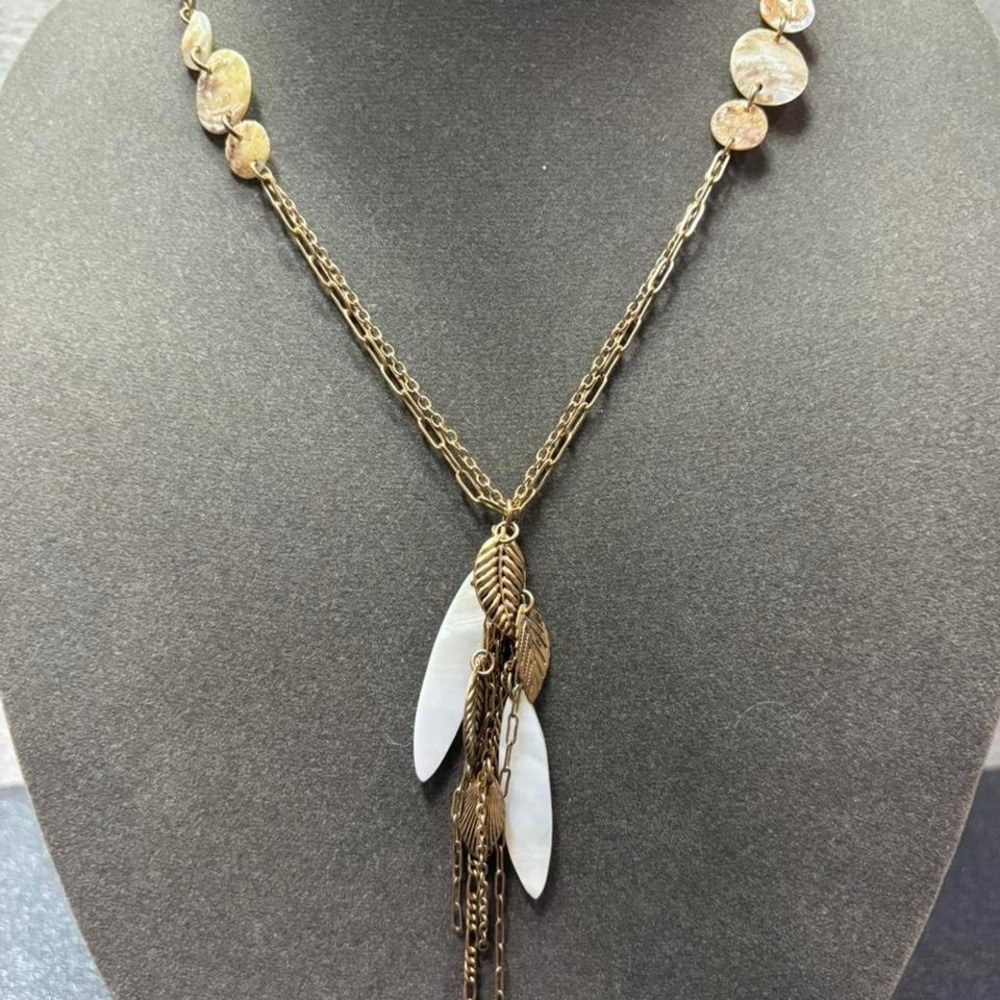 Gold tone leaves and coins shell necklace